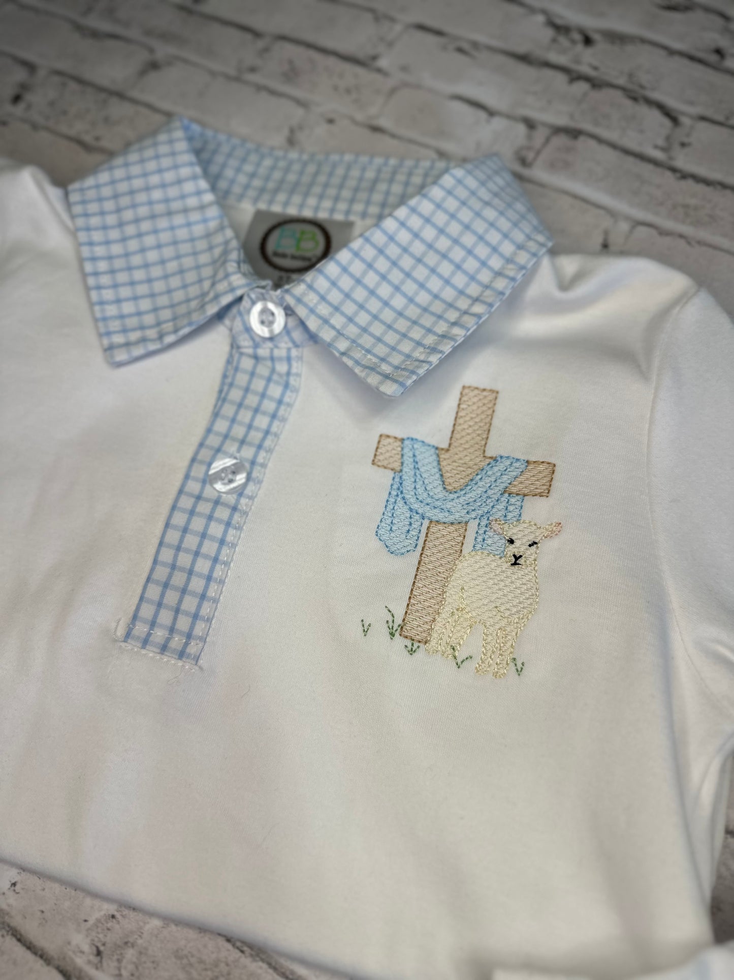 Cross with lamb collared shirt with gingham trim