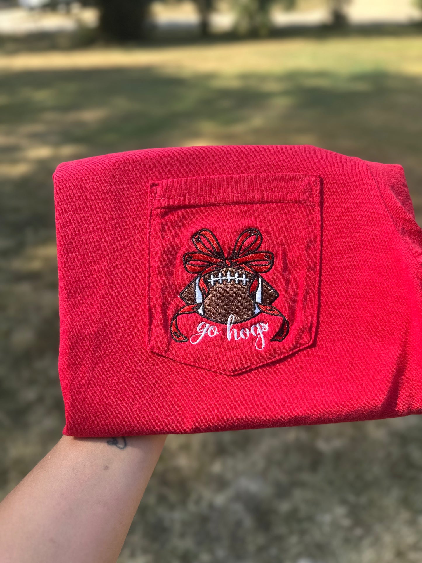 Football with bow CC pocket tee