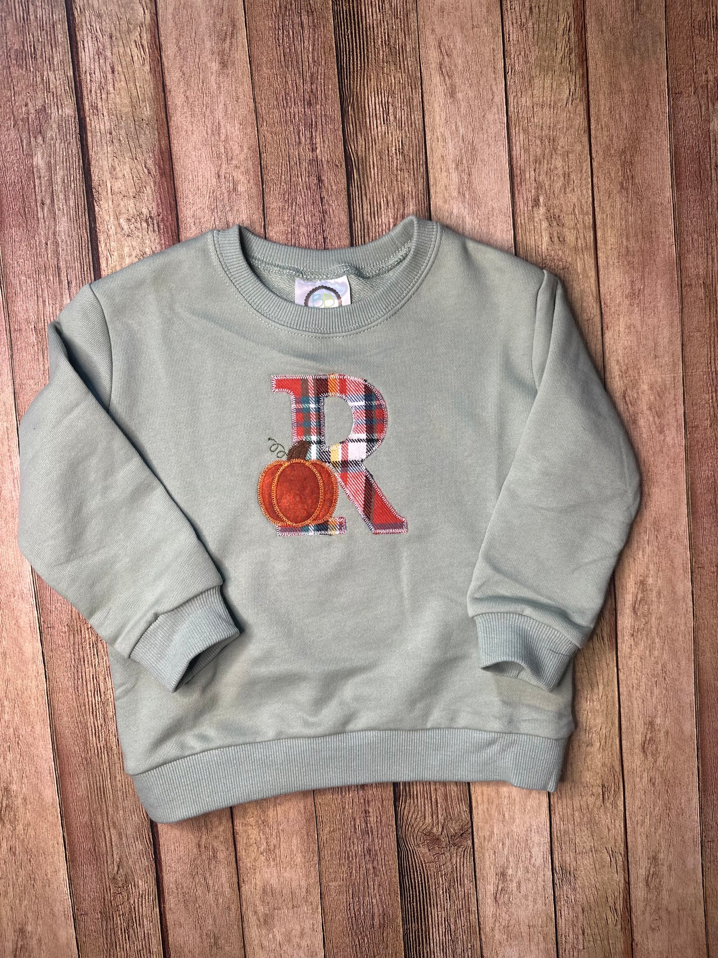 Intial pumpkin appliqué sweatshirt