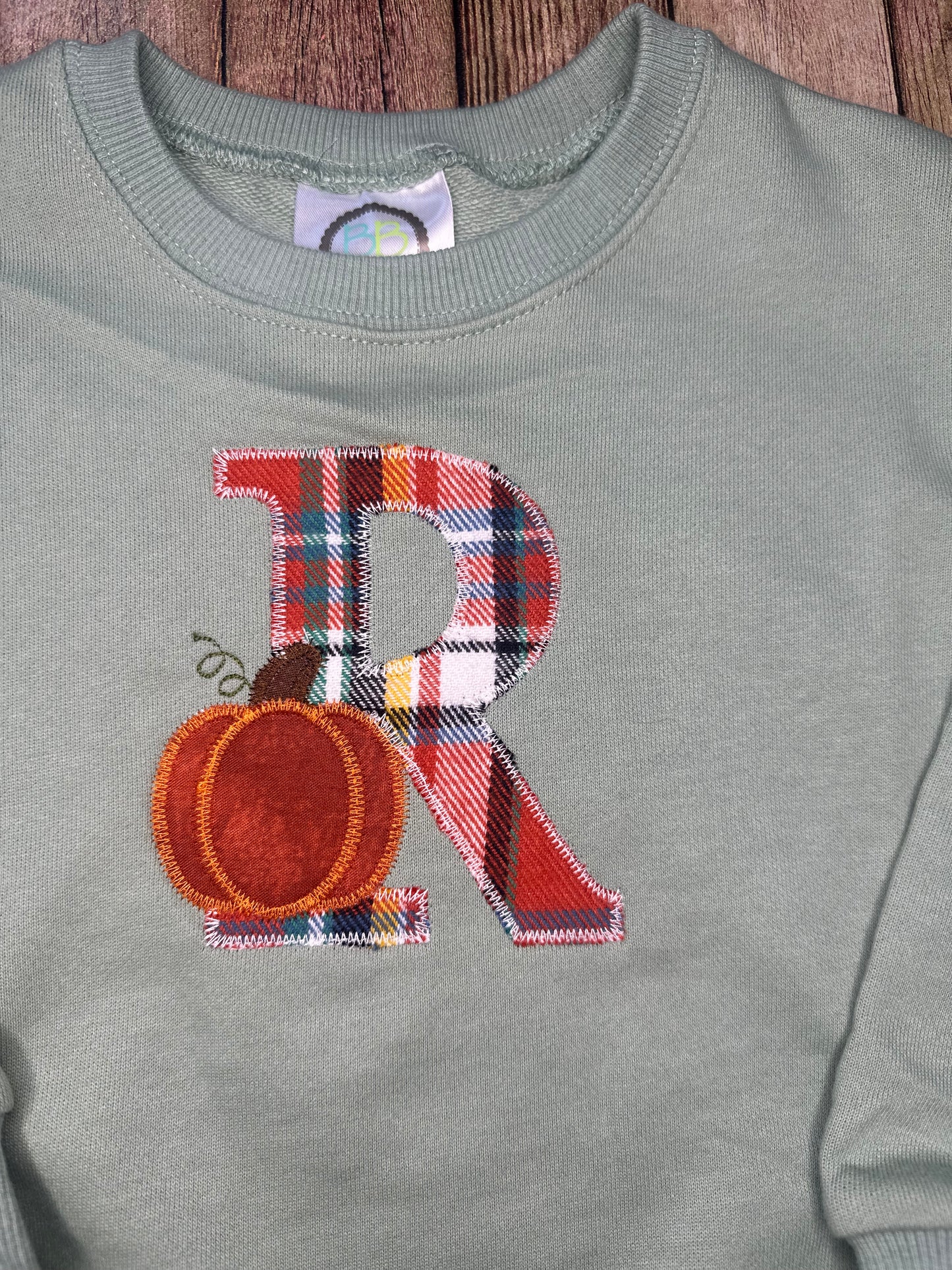 Intial pumpkin appliqué sweatshirt