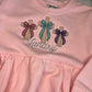 Cross with bow trio dresses