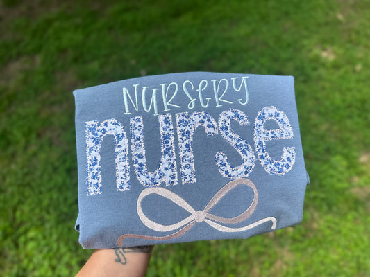 Floral appliqué Nursery Nurse embroidered bow tee or sweatshirt