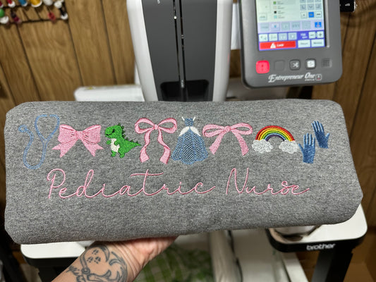 Pediatric nurse and bows