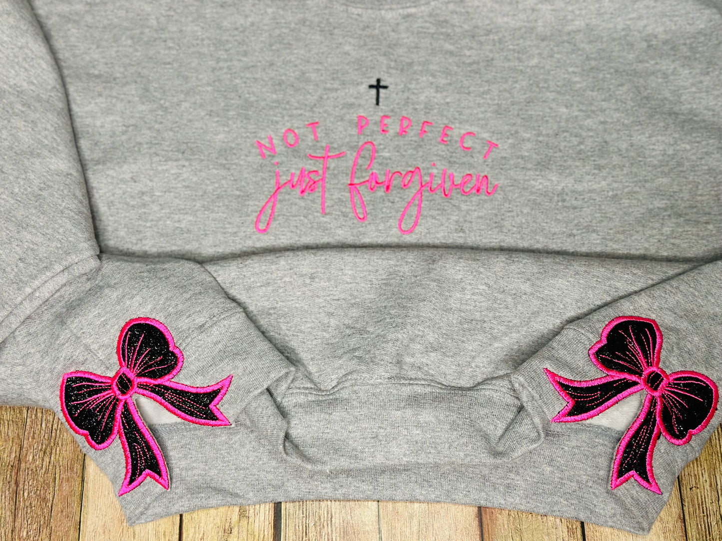 Forgiven tee & sweatshirt with side bow applique