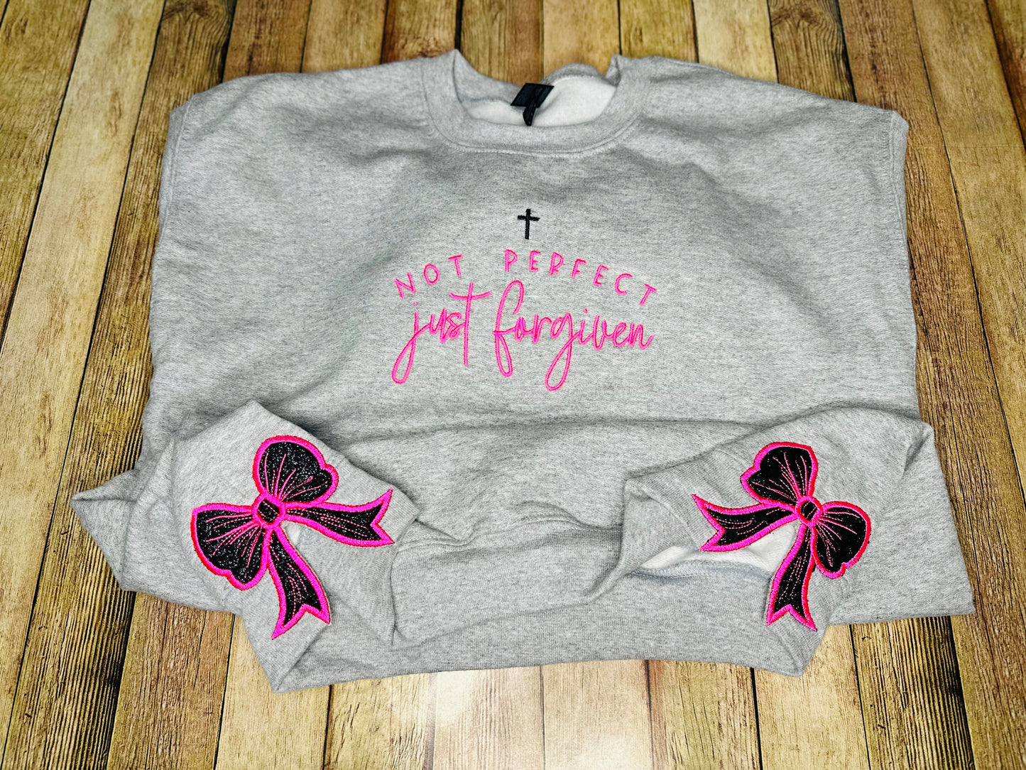 Forgiven tee & sweatshirt with side bow applique