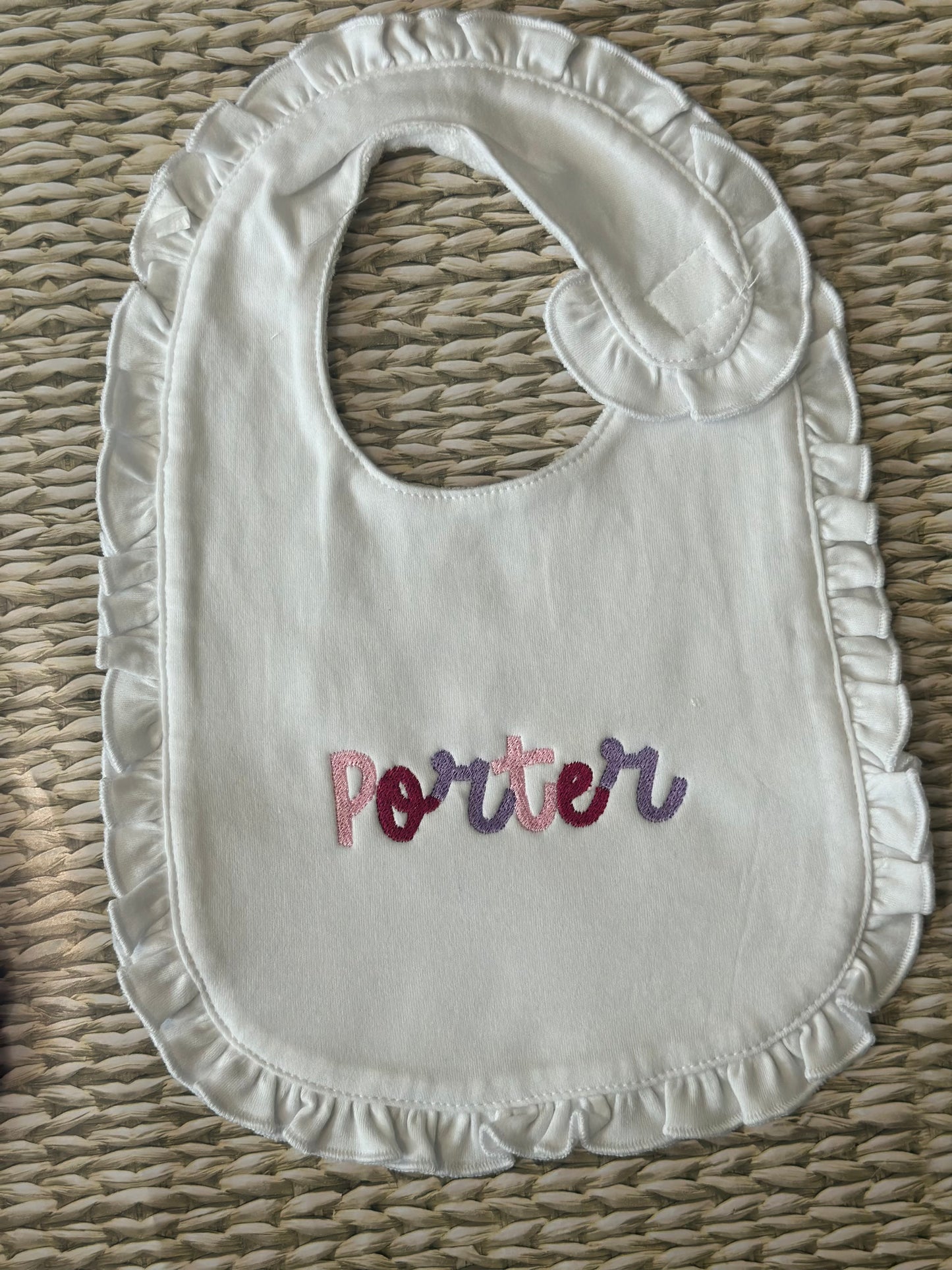 Embroidered name ruffle bib