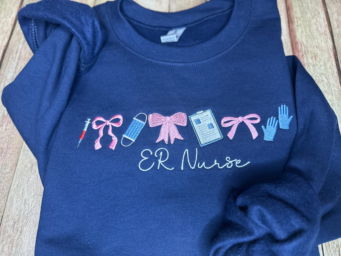 ER Nurse  & bows embroidered tee or sweatshirt