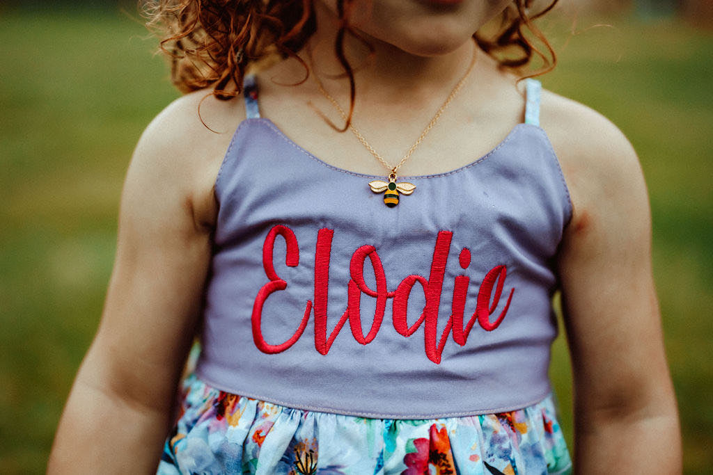 Embroidered lavender floral top