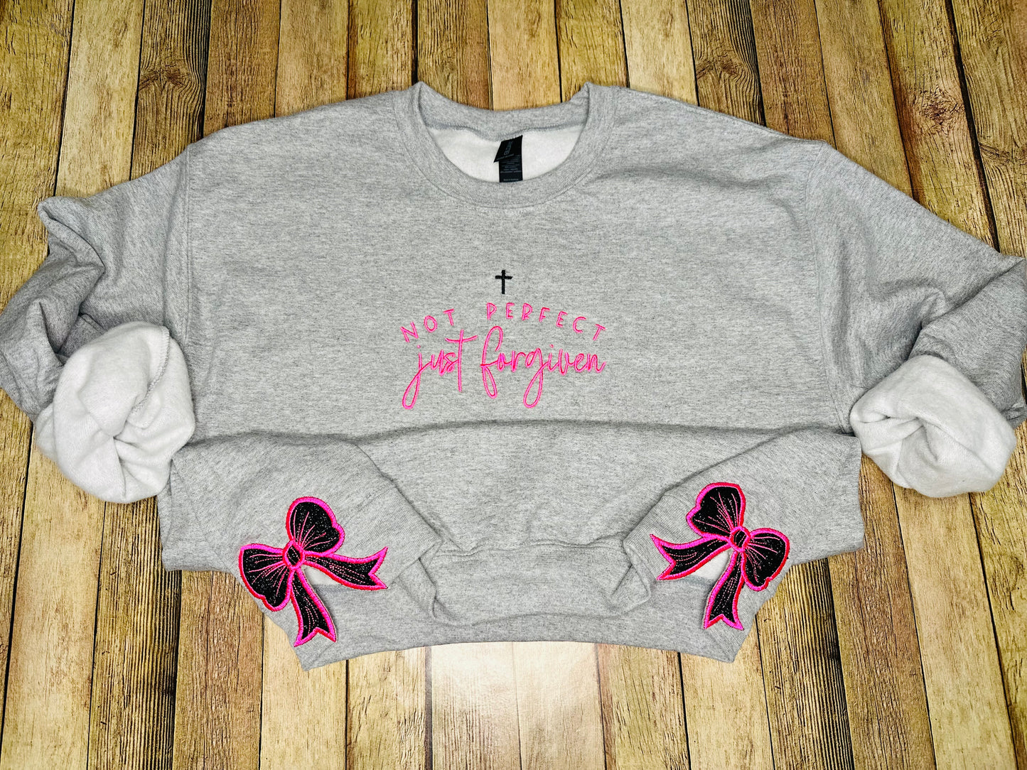 Forgiven tee & sweatshirt with side bow applique