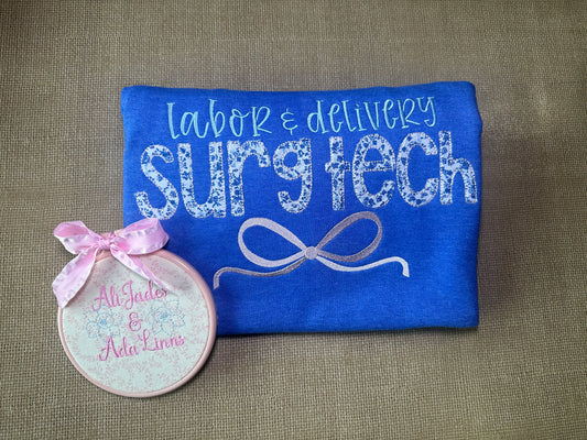 Floral appliqué Labor and Delivery, L&D surg tech embroidered bow tee or sweatshirt